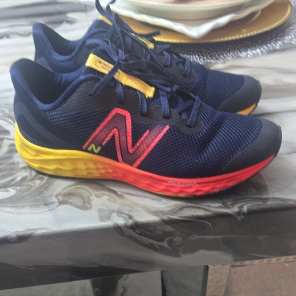 New Balance Dark Blue Sneakers with Vibrant Yellow and Red - Picture 9 of 9